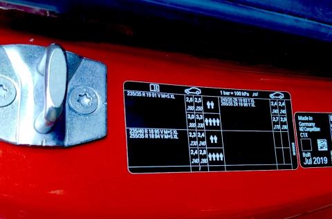 Look on the door jamb for your tyre pressure chart Car tyre pressure chart inside the door