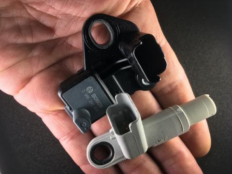 A crankshaft position sensor attaches to the engine block Crankshaft position sensor