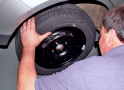 Insert the spare tyre